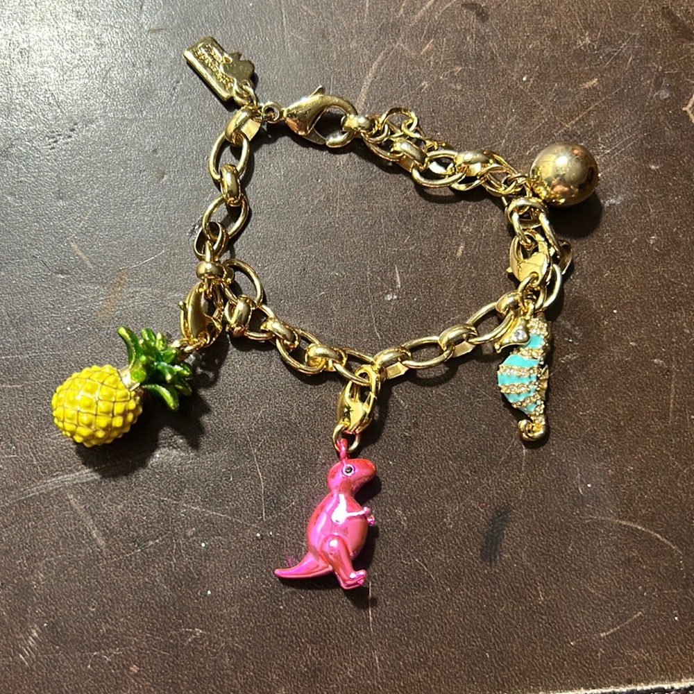 Kate spade charm bracelet with 3 charms